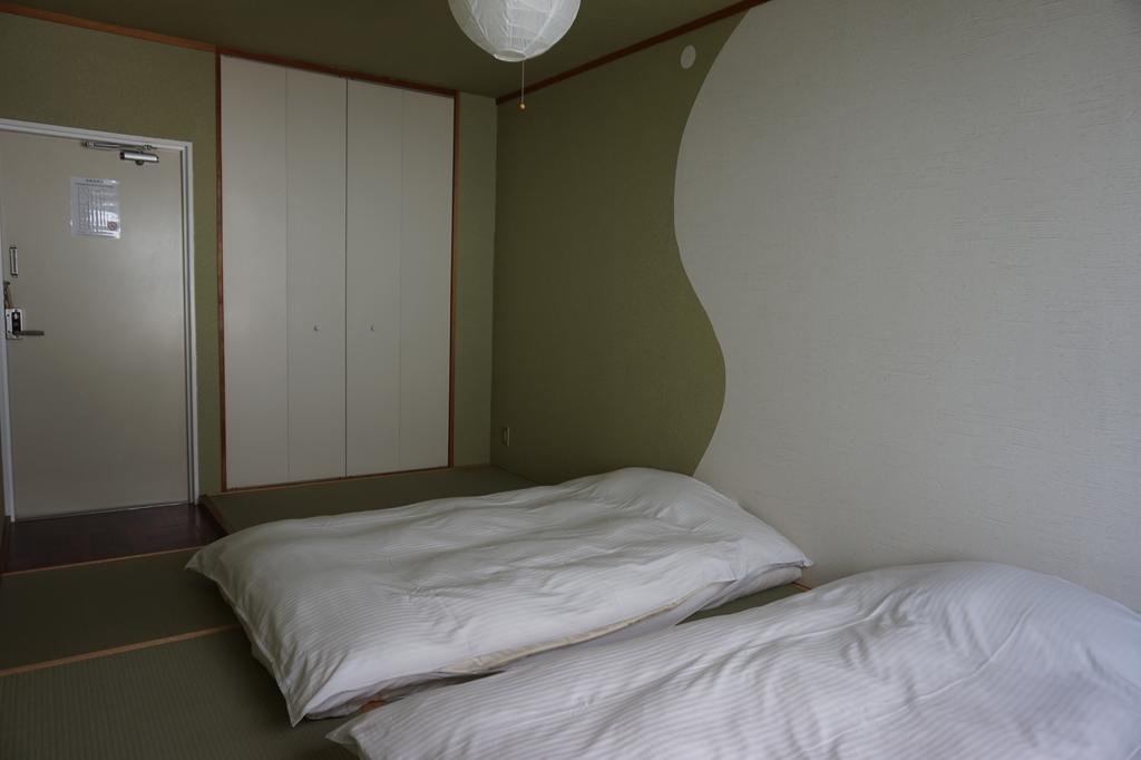 Uni Hostel Osaka Buitenkant foto